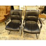 Two leather chrome framed chairs