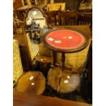 Three tripod base wine tables one with leather insert and a shaped mirror