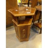 Octagonal wooden hallway table with cupboard,