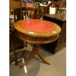 20thC drum table on tripod legs and leather inset