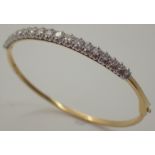 18ct gold and diamond hinged bangle appr