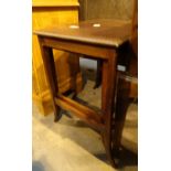 Nest of two mahogany tables with sabre l