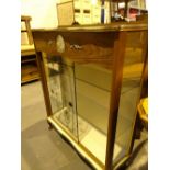 1970s display cabinet with inset clock