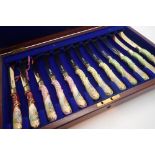 Cased set of twelve top quality Limoges ceramic handled butter knives assay London 1900 makers