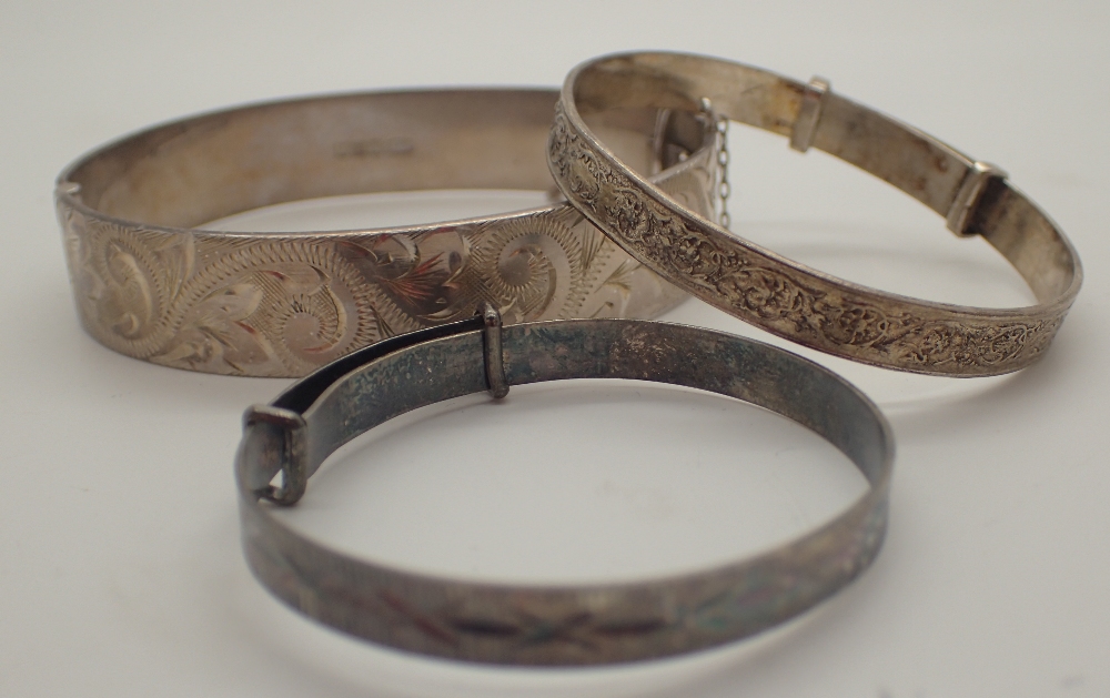 Three hallmarked silver cuff bracelet various assay marks 44g
