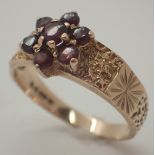 9ct gold ring set with six garnets 3g size N