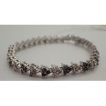 14ct white gold fancy black and white diamond bracelet ( approximate 3ct of diamonds )