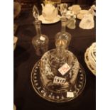 Two Edwardian silver overlaid glass decanters and a similar cheese dome and dish