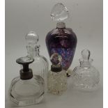 Group of five glass perfume bottles including silver collared examples