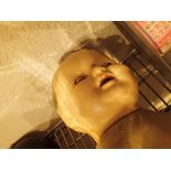 1920s celluloid soft body doll with sleeping eyes and tongue