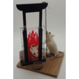 Anthropomorphic taxidermy of two mice and a guillotine
