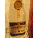 Bottle of Cusenier Anisette level 5cm below bottom of cap label no volume stated but 75cl