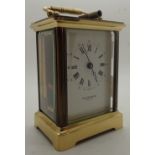 Brass and oak carriage clock by Taylor & Bligh