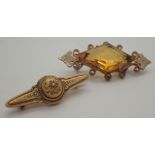 Two Victorian brooches one 15ct gold the other citrine set