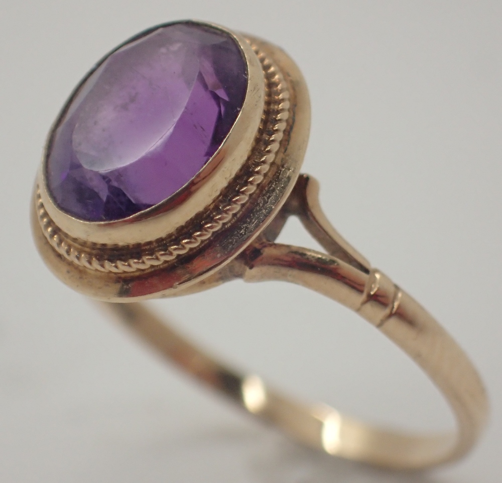 9ct gold ring set with a large amethyst Size O