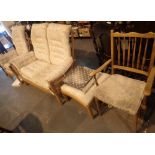 Three piece light wood Ercol suite armchair two seat settee and stool