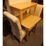 Two tables and two leather dining chairs