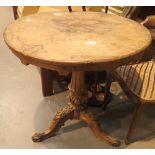 Circular tilt top table with heavily carved tripod base CONDITION REPORT: Top A/F