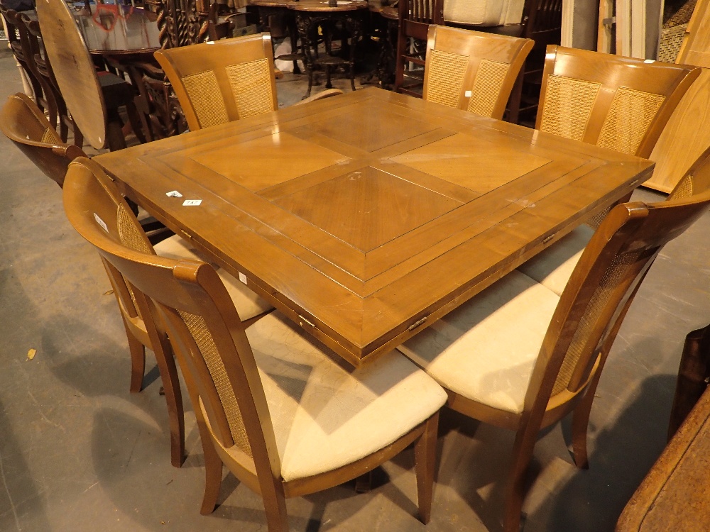 Fold out dining table with eight matching chairs