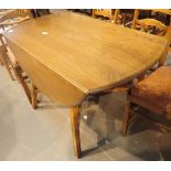 Circular dropleaf Ercol dining table