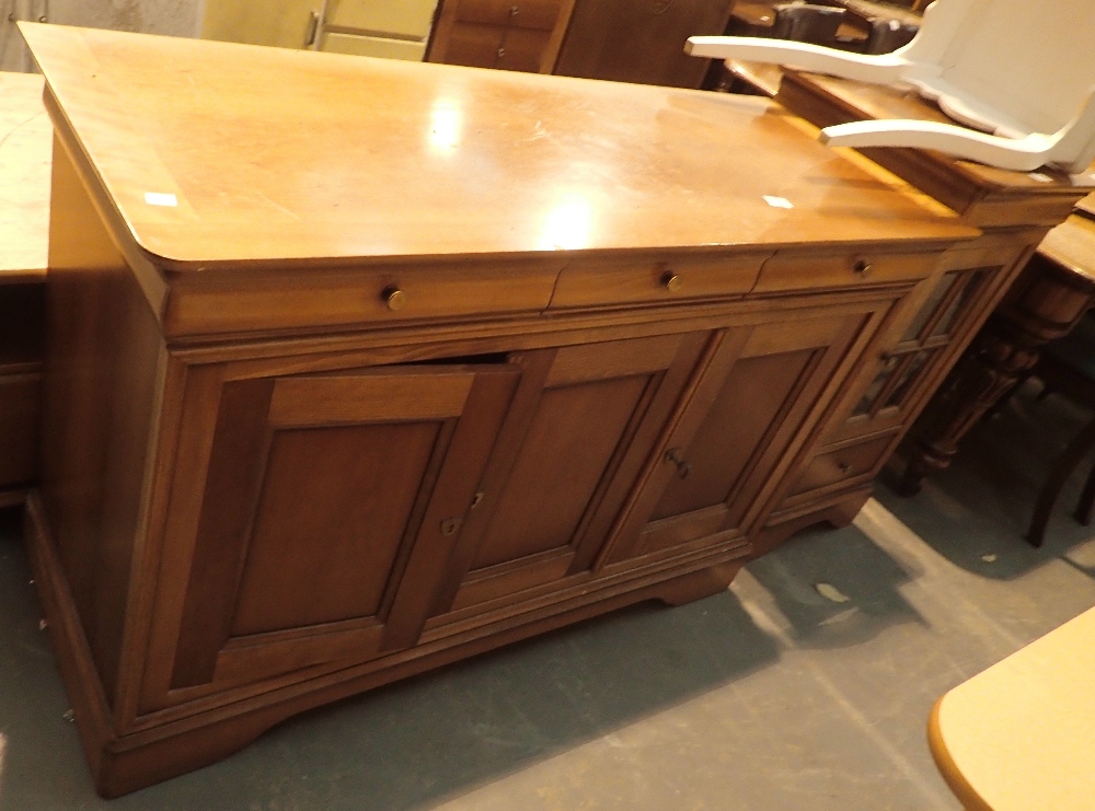 Medium wood three drawer sideboard and matching cabinet