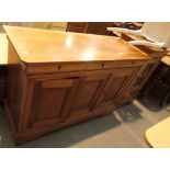 Medium wood three drawer sideboard and matching cabinet