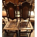 Pair of Victorian Gothic revival upholstered hallway chairs