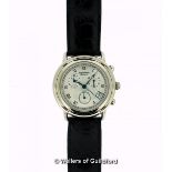 *Gentlemen's Krug-Baumen wristwatch, circular silvered dial with Roman numerals, date aperture and