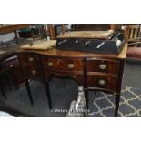 Edwardian inlaid mahogany serpentine fronted sideboard with three drawers, shelved cupboard and