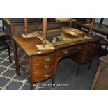 Edwardian mahogany shaped topped ladies desk with barbour pole inlay, seven drawers, 138 x 65 x