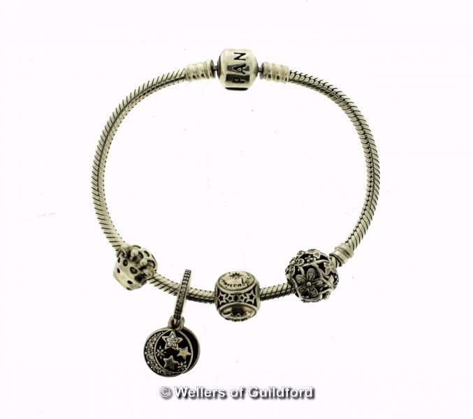 *Pandora bracelet with four charms, length 18cm (Lot subject to VAT)