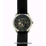 *Gentlemen's Kenneth Cole wristwatch, skeleton dial with Roman numerals, on black leather strap,