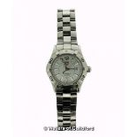 *Ladies' Tag Heuer Aquaracer wristwatch, circular silvered dial with rotating bezel, baton hour