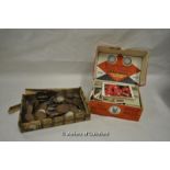 Quantity of coins and cigarette cards