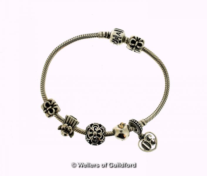 *Pandora bracelet with six charms, length 20cm (Lot subject to VAT)