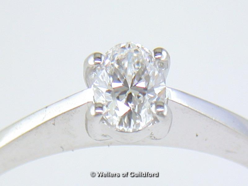 Single stone diamond ring, oval cut diamond, weighing an estimated 0.30ct, estimated colour and - Image 2 of 2