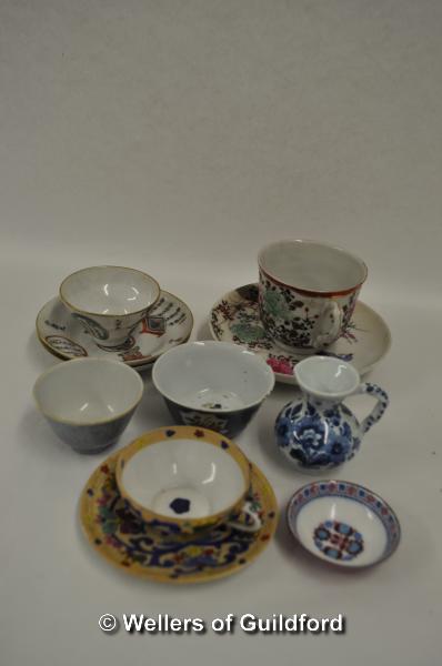 Small selection of Oriental tea cups, saucers