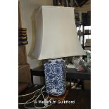 Pair of blue and white lamp bases with cream shades