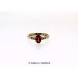 Hessonite garnet and diamond ring, oval cut hessonite garnet, weighing an estimated 0.94ct, with two