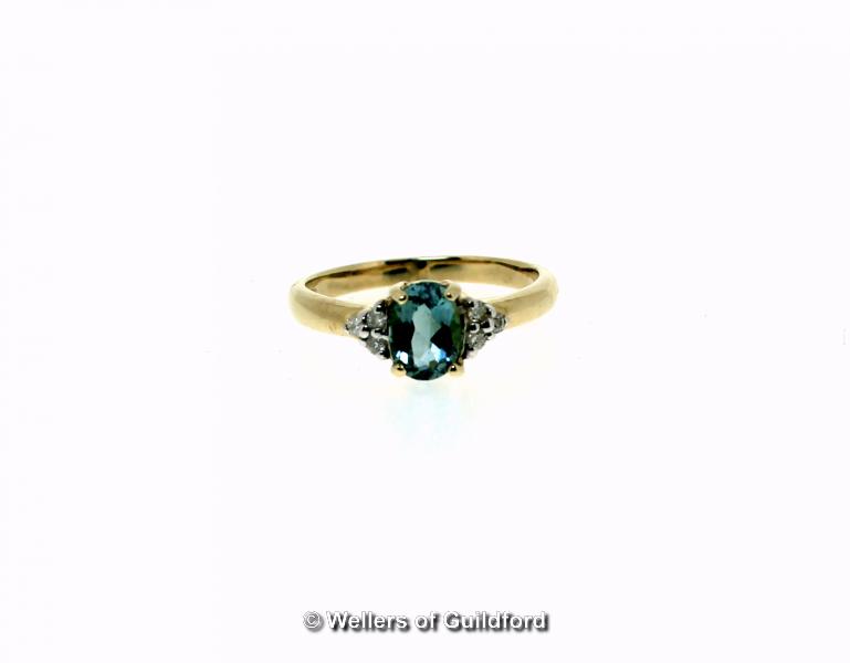 Pairaba tourmaline and diamond ring, oval cut Paraiba tourmaline, weighing an estimated 0.67ct, with