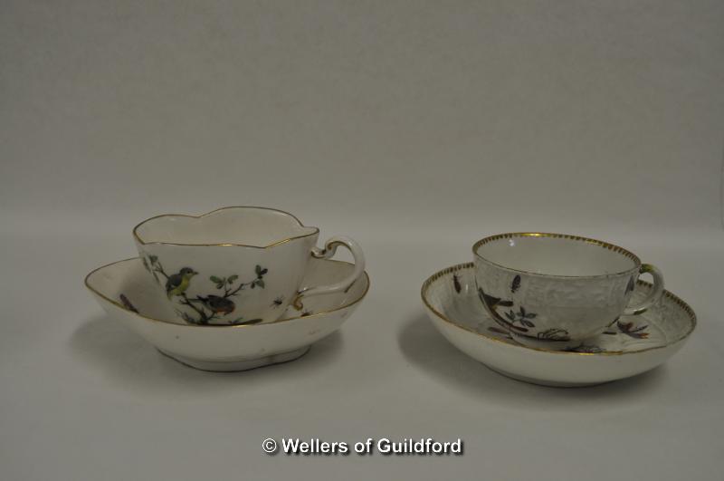 Two Meissen tea cups and saucers; bird, butterfly and bee decoration with gilt detailing