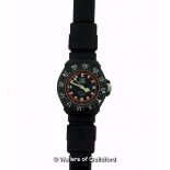 *Ladies' Tag Heuer wristwatch, circular black dial with rotating bezel, luminous dot hour markers