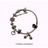 *Pandora bracelet with seven charms and safety chain, length 19cm (Lot subject to VAT)