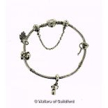 *Pandora bracelet with heart clasp, four charms and a safety chain, length 21cm (Lot subject to