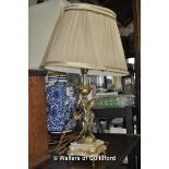 Lamp with marble base, gilt cherub stem and folded fabric shade