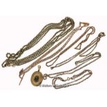 Selection of six yellow metal chains stamped 9ct, including a two row longuard, an Albert chain,