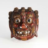 Tibetanische Maske - Mahakala. Wohl 19. Jh., innen mit Ausfuhr?-Siegel. Holz, mit alter Farbfassung.