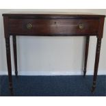 A Georgian mahogany single drawer sideboard on tur