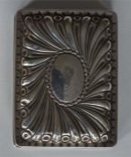 A rectangular swirl decorated box with reeded deco