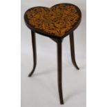 A heart decorated occasional table. Est. £50 - £80